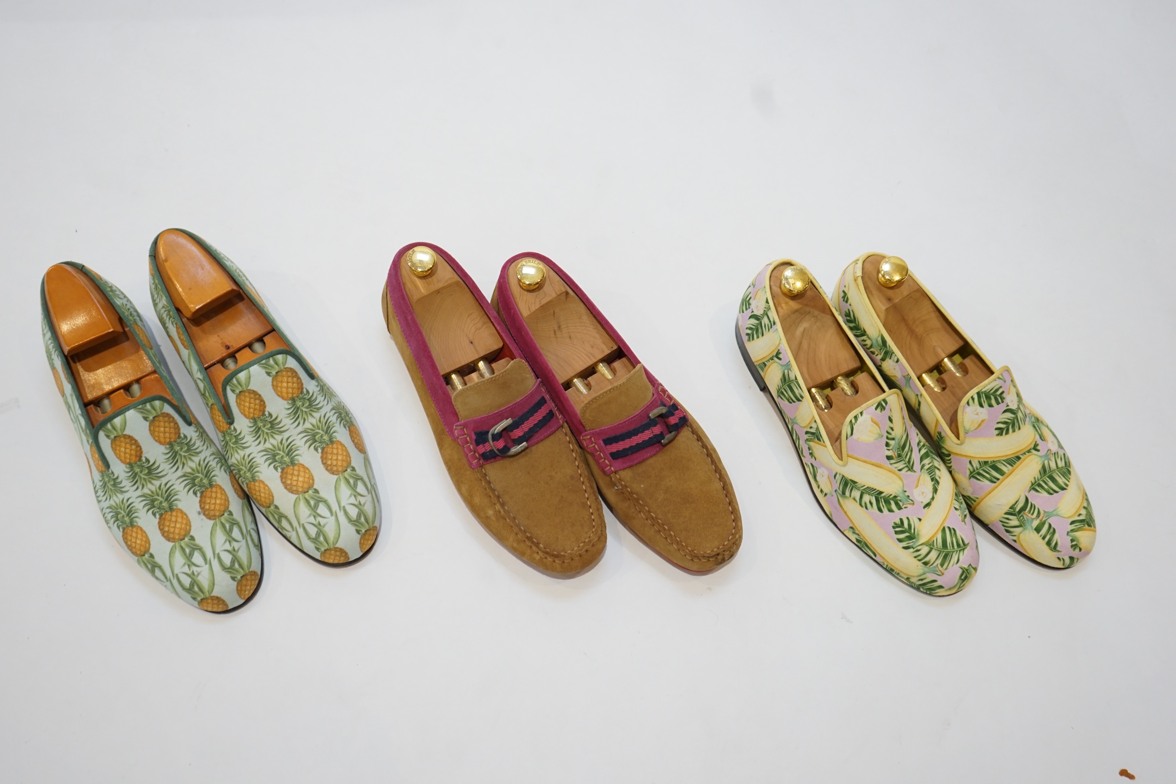 Three pairs of gentleman's Gresham Blake loafers; canvas pineapple print, size 44, canvas bananas, size 43 & suede, size 42.